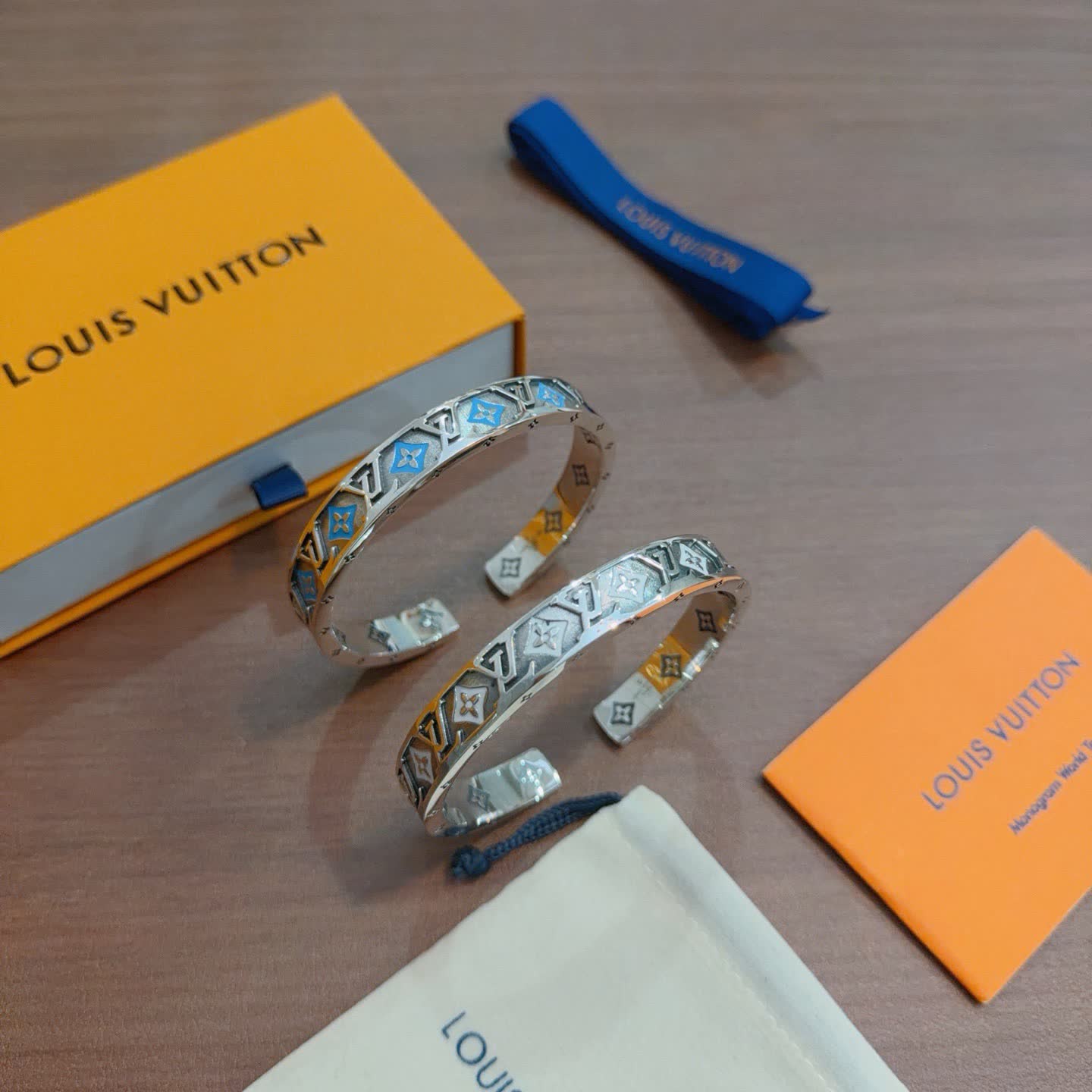 Louis Vuitton Silver Bracelet with Blue and Orange Accents